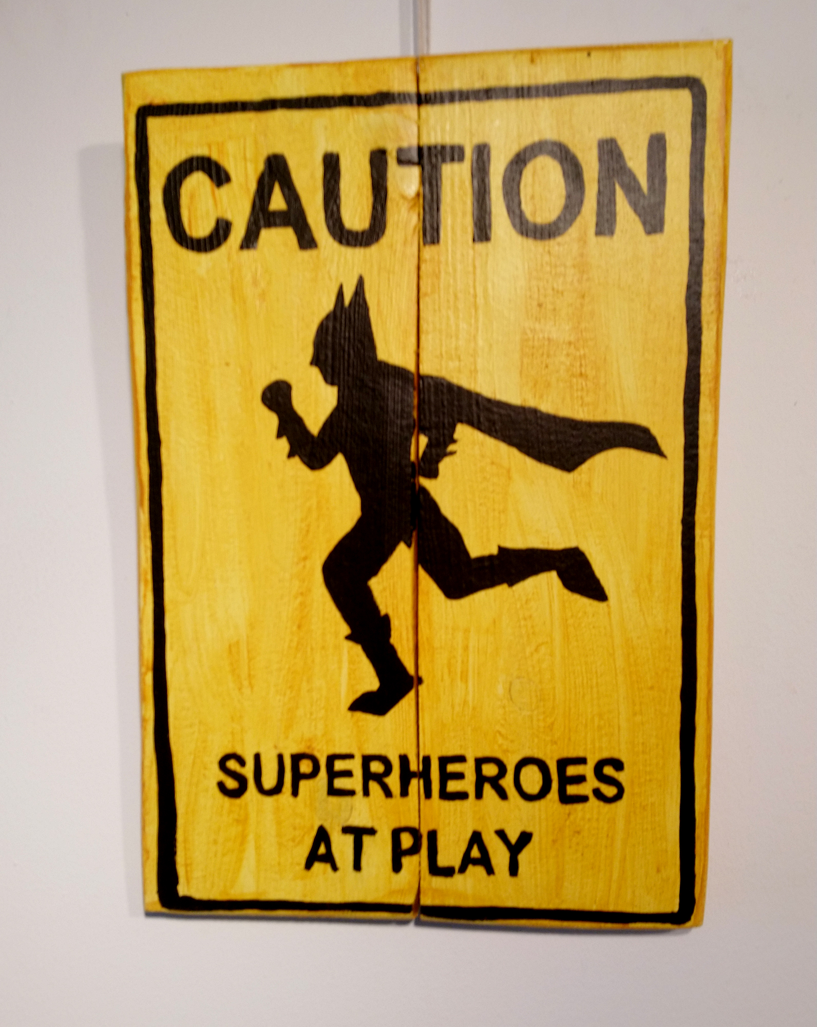 Cuadro cartel Batman Caution superheroes at play