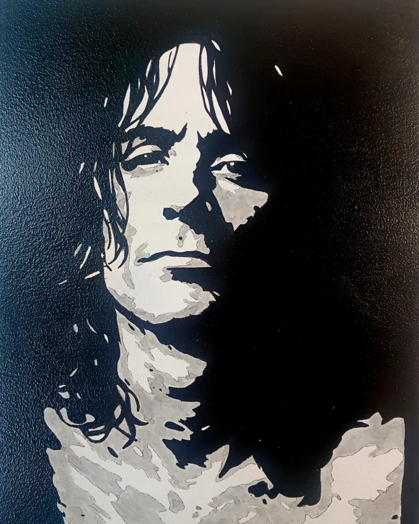 Robe Iniesta en retrato stencil blanco y negro, obra artística de Irreverentes