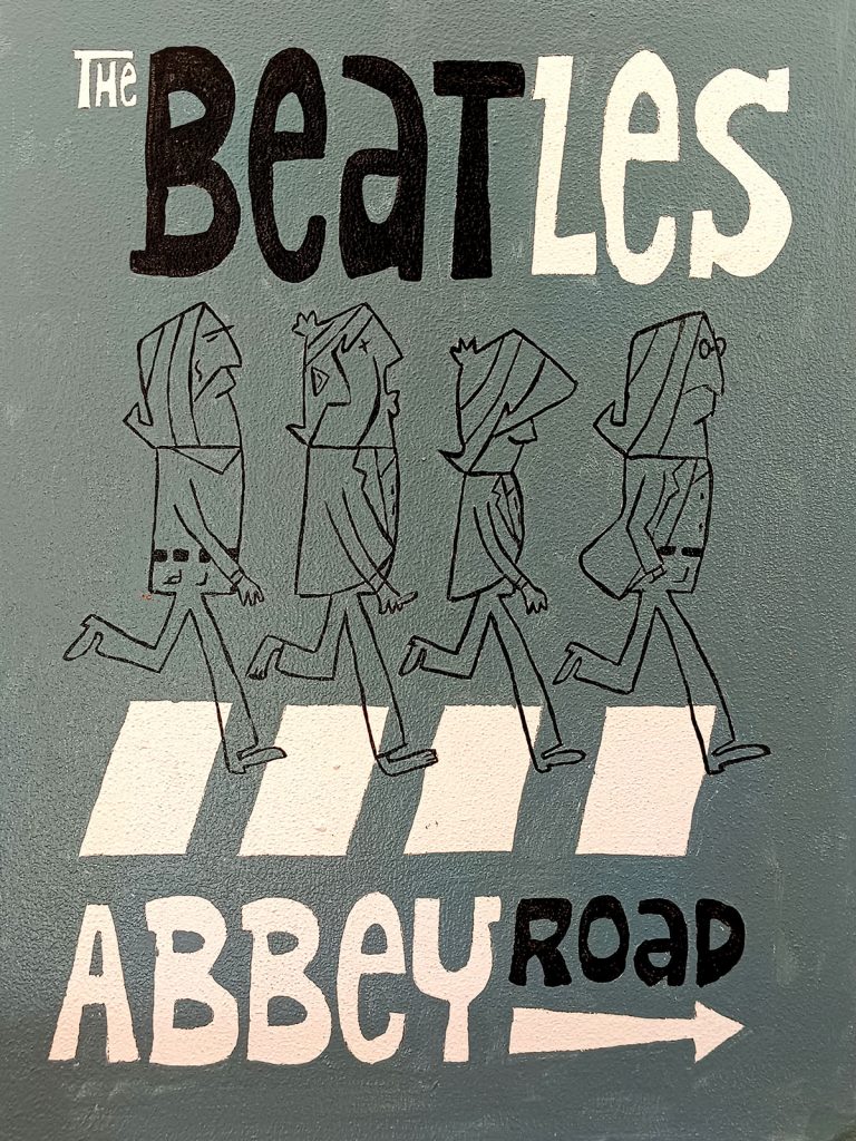 Ilustración de los Beatles cruzando Abbey Road en estilo cartoon minimalista