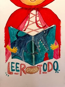 Cuadro pintado a mano de Caperucita Roja leyendo un libro con la frase “Leer cambia todo”
