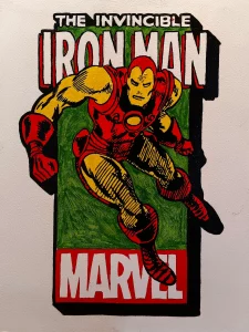 Ilustración de Iron Man en estilo cómic clásico de Marvel con el texto “The Invincible Iron Man”.