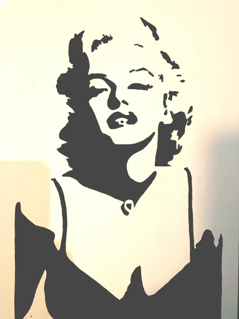 Retrato de Marilyn Monroe en estilo stencil blanco y negro de alto contraste