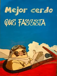 Porco Rosso pilotando su hidroavión con la frase "Mejor cerdo que fascista" inspirada en la película de Studio Ghibli